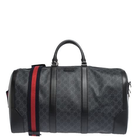 black gucci duffle bag.